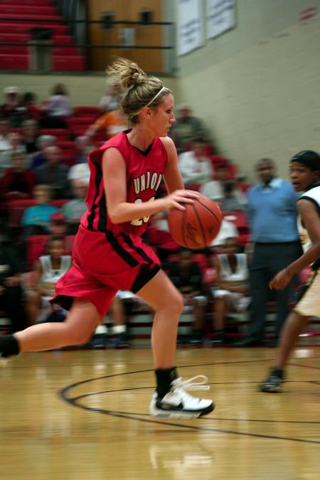 Union freshman Kayla Hudson drives the lane during Union's Homecoming victory over Harris-Stowe State College (Mo.).