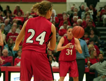 Union sophomore Laura Crittendon (24) passes the ball to Merideth Richardson Jacobs (31)during Union's Homecoming win over Harris-Stowe State College (Mo.).