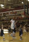 Union junior Josephine Owino lays the ball in for two points. - Photo by Jordan Buie