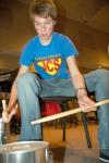 Charles Googe, sophomore history major, rehearses various beats on the paint cans that he uses
as tenor drums with the hopes of inspiring school spirit at sporting events on the drumline. 
 - Photo by Matthew Diggs