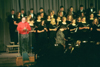 President David S. Dockery leads in prayer during <i>A Union Christmas</i>. - Photo by Jim Veneman