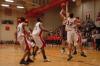 Freshman Veljko Petrovic (32) jumps to block a shot against Freed Hardeman.  - Photo by Neisha Fuson