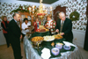Union trustees and employees enjoy a spread at the home of President Dockery for his annual open house Christmas party.
 - Photo by Jim Veneman