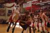 Sophomore Tacuma Alexander (3) leaps to block the ball from his Freed Hardeman opponent.  - Photo by Neisha Fuson