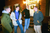 Nathan Robertson, Daniel Davis, Nathan Michael, and Keelan Cook share a moment of laughter while greeting attendees at the Dockery's open house Christmas party.

 - Photo by Jim Veneman