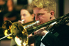 Andy Morris plays his trombone in the Symphonic Band during <i>A Union Christmas.</i>
 - Photo by Jim Veneman