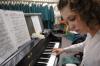Hannah Smith practices for her recital in a choir robing room that also doubles as a music professor's office at West Jackson Baptist Church as reconstruction continues in Jennings Hall. - Photo by Kyle Kurlick