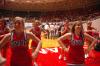 The Bulldog Cheerleaders keep the atmosphere positive during the first game at the NAIA.  - Photo by Neisha Fuson