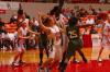 Freshmen Zeinab Chan (33) and Laura Crittendon (24) work together to block their opponents in the NAIA.  - Photo by Neisha Fuson
