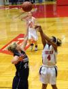 Jessica Graves releases a shot against The Master's College (Calif.) during the second round of the NAIA national tournament. - Photo by Morris Abernathy