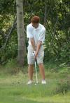 Tyler Lay chips from just off three green. - Photo by Steven Aldridge