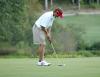 Gary Glapa gets in his putting stance during play at Falcon Ridge Golf Club. - Photo by Steven Aldridge
