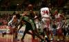 Players from Union University and the University of Sciences and Arts battle for the ball during the first round game of the NAIA tournament.  the Lady Bulldogs would go on to win the game. - Photo by Kristi McMurry