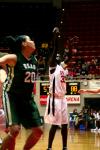Zeinab Chan follows through on a free throw shot during the first round of the NAIA tournament. - Photo by Kristi McMurry
