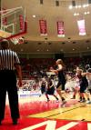 Players from Union University and The Master's watch as a shot goes in to put the Lady Bulldogs up by two more points.   - Photo by Kristi McMurry