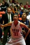 Merideth Richardson Jacobs boxes out under the basket during the second round game of the NAIA tournament against The Master's. - Photo by Kristi McMurry
