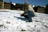 Snow covered Union's campus the night of Mar. 7, and students took a break from studying to play in it. Sophomore Heather Songer prepares a snowball as she participates in a snowball fight.  - Photo by Stephanie Schroeder