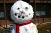 Snow covered Union's campus the night of Mar. 7, and students took a break from studying to play in it.  A ten foot snow man stands in front of Rogers in McAfee. - Photo by Stephanie Schroeder