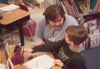 Assignment: Alison Oshel/Student Teacher - According to Oshel, working with students one on one and giving them individual attention is a quality every teacher should possess. In this photo she helps Logan Martin with his assignment. - Photo by Lindsay Stavish