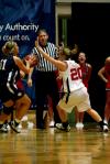 Kayla Hudson defends a Vanguard player during the semi-final game of the NAIA tournament.  - Photo by Kristi McMurry