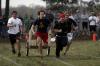ATO chariot runners begin dash down the field at the Greek Olympics. - Photo by Kyle Kurlick
