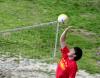 Todd Buck, sophomore accounting major, hits the ball over the net during the volleyball tournament that raised money for the disaster relief fund. - Photo by Kristi McMurry