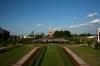 Graduates file into their seats during the Spring 2008 graduation ceremony.  The ceremony was held on the Great Lawn, between Jennings Hall, White Hall and Miller Tower.  Off in the distance, attendees could see the construction of the new dorms. - Photo by Kristi McMurry