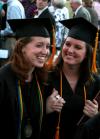 Julie Mitchell and Kirby Maxwell, social work majors, walk to their families after Spring 2008 graduation.  Many students in departments at Union, such as the social work department, show great companionship and closeness. - Photo by Kristi McMurry