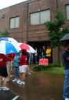 Faculty, staff and students wait outside the McAfee commons to help move Union's newest students in despite the drizzly rain. - Photo by Kristi McMurry