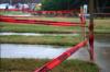 Danger tape was used to block access to the newly laid sod on the day that new students moved into Union.   - Photo by Kristi McMurry