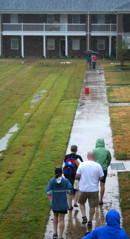 Faculty, staff, and upperclassmen helped new Union students move into the brand new residence life complex despite cold rain and muddy sidewalks.
