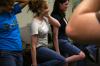 Elaura Highfield, Courtney Burton, and Kara Dukes participate in a game during their first meeting with their Focus group. - Photo by Kristi McMurry