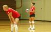 Lindsey Wallach (right) waits for her turn to serve, while Amanda Coyle gets ready for the play. - Photo by Steven Aldridge