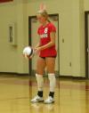 Amanda Hutchison Coyle prepares to serve the ball. - Photo by Steven Aldridge
