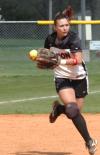 Brittany Burkett throws to first on the run after make a play at third base. - Photo by Steven Aldridge