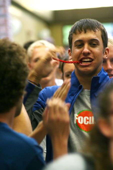 Chase Tuggle, theology major, excitedly rushes into the dinner with your department event eating a pre-meal snack.  