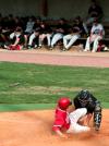 Josh Holman, senior physical education and health major, slides safely into home as the catcher tries to tag him out.  The Bulldogs beat Crichton 12-5. - Photo by Kristi McMurry