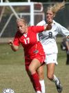 Abigail Williams advances the ball up the field as she out runs her nearest defender. - Photo by Steven Aldridge