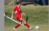 Jill Landers advances the ball to one of her teammates. - Photo by Steven Aldridge
