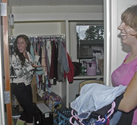 Cassidy O'Hare of Lubbox, Tex. shows off her newly organized closet during Freshman Move-In Day.