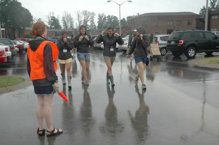 Lily Zopfi stands ready to direct freshman traffic as Haley Gallagher, Mallory Carter, Kari Beougher and Tiffany Fredericks dawn the hoods of their rain jackets - a gift for Focus leaders that turned out to be very useful while helping with freshman move-in. 