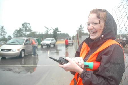 Focus leader Lily Zopfi enjoys her task of directing traffic during Freshman move-in day. 