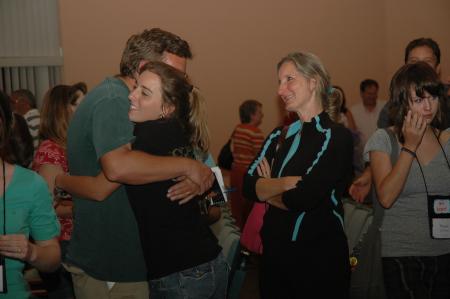 Amanda Ellis from Arlington, Tenn. hugs her dad as she says goodbye after the Focus evening worship service.