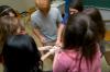 Scott McSwain's FOCUS group pulls apart a frozen t-shirt during a team building exercise. - Photo by Angela Abbamonte