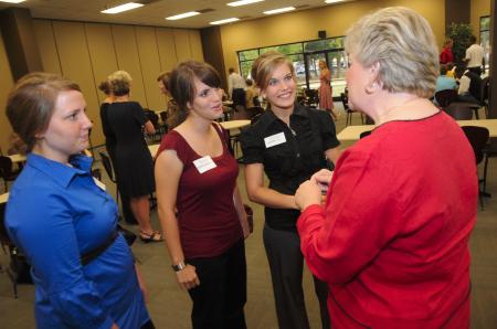 First Lady Lanese Dockery fellowships with Ashley Diehm and Heather Childress at the President's Reception.