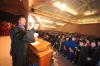 Christopher Mathews, new chair of the music department, leads the music during the fall convocation service. - Photo by Morris Abernathy