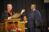 President Dockery installs Roland Porter as the director of the Center for Racial Reconciliation during fall convocation. - Photo by Morris Abernathy