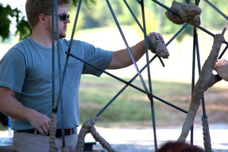 Rob Alsobrook, Union alumni, conducted a sculpture workshop for Union art majors outside the photo house.  Alsobrook and his assistants packed clay with seeds in it onto a metal form, hoping that in time the seeds will drop and plants will grow.