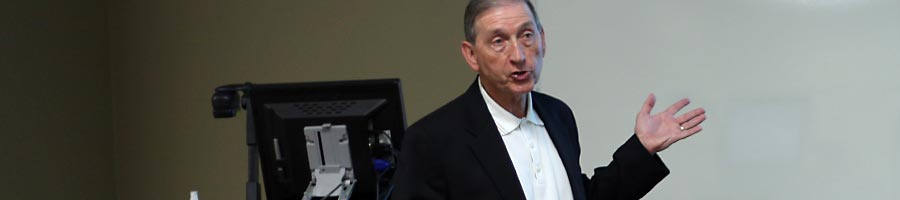 Dr. Rosebrough lectures.