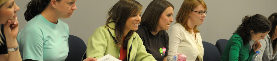 Students listen and take notes in class.